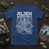 Alien Weaponry text above a detailed illustration of an alien creature holding a futuristic rifle, printed on a blue t-shirt