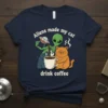 Aliens made my cat drink coffee text with cartoon alien pouring coffee for a grumpy cat graphic