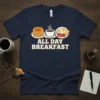 Navy t-shirt with "ALL DAY BREAKFAST" text and graphics of waffles, coffee, eggs, and bacon