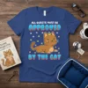 T-shirt with "ALL GUESTS MUST BE APPROVED BY THE CAT" text and a cartoon cat wearing a crown