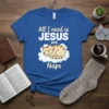 All I need is JESUS and Naps text with a sleeping cat on a cloud graphic on a blue t-shirt