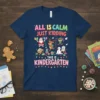 All Is Calm Just Kidding This Is Kindergarten text with Santa, reindeer, elf, and snowman graphics on a navy t-shirt