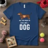 Dachshund t-shirt with "All You Need Is Love And A Dog" text and heart graphic