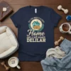 T-shirt design featuring the quote "All You Need Is A Cozy Home And A Dog Named Delilah" with a sleeping