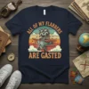 Raccoon pilot in a biplane with text "ALL OF MY FLABBERS ARE GASTED" on a navy t-shirt