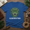 Alligator Attack t-shirt design featuring a fierce green alligator head with sharp teeth and vines, text below reads ALLIGATOR ATTACK