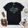 Black t-shirt with "Aloha Akbar ALOHA AKBAR" text in turquoise and red hibiscus flowers surrounding it