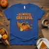Always Grateful Thanksgiving t-shirt with cornucopia graphic and fall leaves, blue shirt