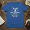 Amat Victoria Curam Latin quote t-shirt with a winged figure, lion, and laurel wreath design in white and gold
