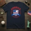 Navy blue t-shirt with "AMERICA AMERICA" text, American flag shield, and eagle graphic in red, white, and blue