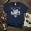 Navy blue t-shirt with bold white text "AMERICA UNCANCELED" below an eagle holding a USA flag and a shield emblem