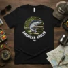 American Angler t-shirt with a salmon graphic against a camouflage and American flag circular design