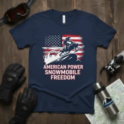 American Power Snowmobile Freedom text with American flag and snowmobiler graphic on a navy t-shirt