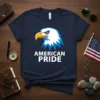Navy t-shirt with bold white text "AMERICAN PRIDE" above a graphic of a bald eagle's head