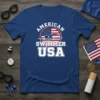 American Swimmer USA text with US flag and swimmer graphic on a blue t-shirt