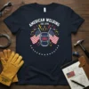 American Welding Est. 1776 t-shirt with welding mask, American flags, and fireworks graphic