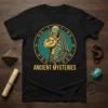 T-shirt featuring an Egyptian cat wearing a pharaoh's headdress, surrounded by hieroglyphs, with the text ANCIENT MYSTERIES below