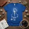 Ancient Petroglyph Art t-shirt design featuring a central figure surrounded by deer, hunters, and tribal symbols in white on a