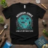 Aquarium Junkie Living Life One Tank At A Time t-shirt design featuring fish, plants, and aquarium equipment