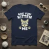 Are You Kitten Me t-shirt with a cute cartoon cat wearing glasses and paws