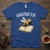 Arizbeth queen bee wearing a crown sits on an open book, personalized name shirt design