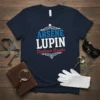 Arsene Lupin Gentleman Burglar text design with decorative elements on a navy blue t-shirt