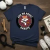 Ask Me About Karate T-Shirt with a cartoon red panda wearing a karate gi and black belt