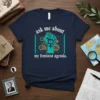 Navy t-shirt with "ask me about my feminist agenda" text and a teal raised fist graphic with gears