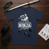 Ninja graphic with text "Ask me about my NINJA Disguise" on a navy t-shirt