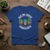 Ask Me About Sukkulente t-shirt design featuring potted succulents and books, with white text in a circle