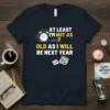 At least I'm not as old as I will be next year funny birthday quote t-shirt design with alarm clock