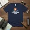 Attitude Determines Altitude quote with rocket launching graphic on navy t-shirt