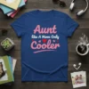 Aunt like A Mom Only Cooler text design on a navy blue t-shirt, featuring pink and red heart accents