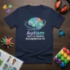 Navy t-shirt with "Autism isn't a choice Acceptance is!" text and a colorful puzzle brain graphic, promoting autism acceptance