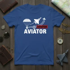 Blue t-shirt with bold white text "AVIATOR AVIATOR" and graphics of a parachute, globe, and jet