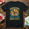 Awesome Awesome Since 2013 T-Rex birthday t-shirt with retro sunset graphic and party hat