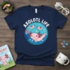A navy blue t-shirt featuring the text "AXOLOTL LIFE" in white, surrounding a cute pink axolotl graphic with smaller axolotls