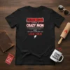 Black t-shirt with "BACK OFF! I HAVE A CRAZY MOM SHE HAS ANGER ISSUES AND A SERIOUS DISLIKE FOR STUPID