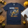 Backhoe Power Dig It. Build It. construction t-shirt featuring a yellow backhoe graphic and construction-themed text