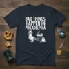 Bad Things Happen In Philadelphia text with a cartoon pigeon in a football helmet, hot dog, and Liberty Bell graphic