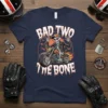 Bad Two The Bone skeleton riding a motorcycle with flames, graphic t-shirt design