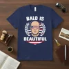 Bald Is Beautiful t-shirt design with a bald man wearing American flag sunglasses, framed by a laurel wreath and the