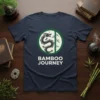 Bamboo Journey t-shirt with a black dragon and bamboo stalks in a green circle, white text below