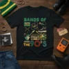 Black t-shirt with "Bands Of The 90's" text and graphics including cassette, microphone, guitars, and boombox