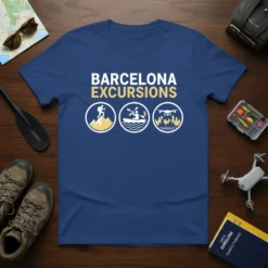 Blue t-shirt with "BARCELONA EXCURSIONS" in white and yellow text, featuring icons for hiking, kayaking, and drone city exploration