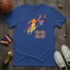 Basketball Player 23 dunking with a basketball, featuring colorful streaks and stars, on a royal blue t-shirt