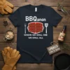 BBQ anon WHERE WE GRILL ONE WE GRILL ALL text with graphic of grill and skewers on a navy t-shirt