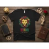 Black t-shirt with BE KIND 1 GOD 1 BLOOD 1 LOVE text and a lion graphic with Rasta colors, featuring