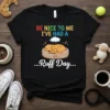 Black t-shirt with colorful text "BE NICE TO ME I'VE HAD A" and a sleeping puppy graphic below, saying "...Ruff