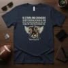 Navy t-shirt with "BE STRONG AND COUIAGEOUS" scripture and football player graphic, Deuteronomy 31:6